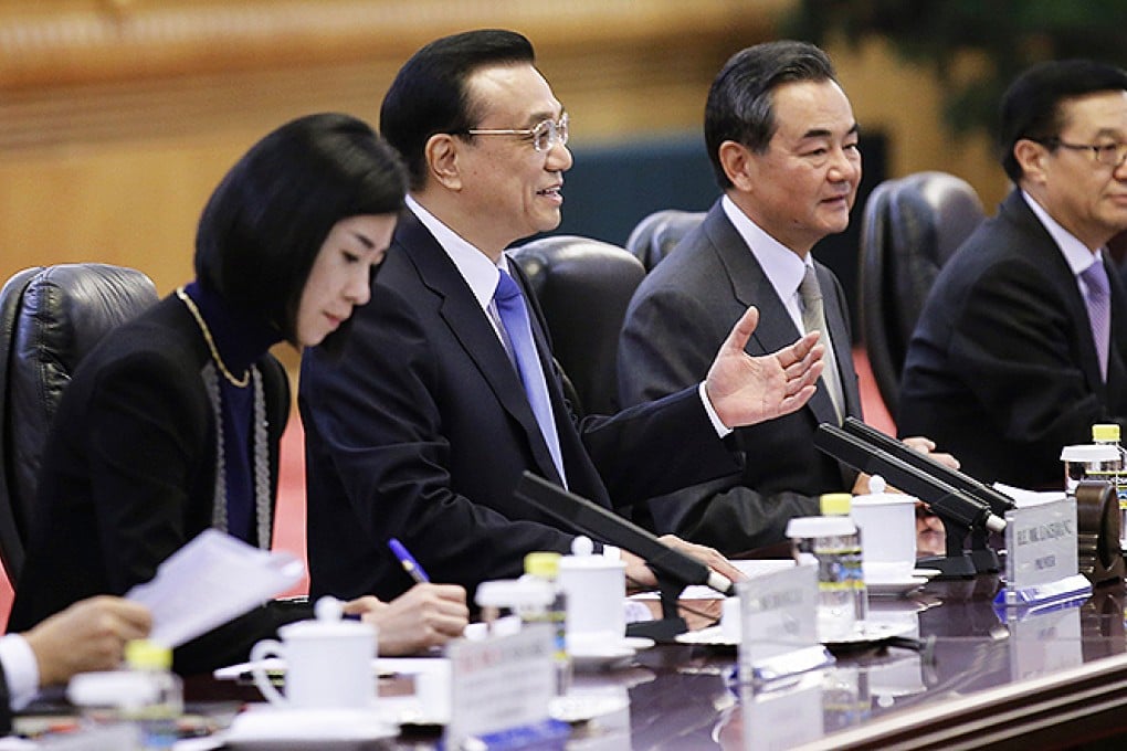 Chinese Commerce Minister Gao Hucheng (right) with Premier Li Keqiang (left) and Foreign Minister Wang Yi at a recent meeting in Beijing. Photo: Reuters
