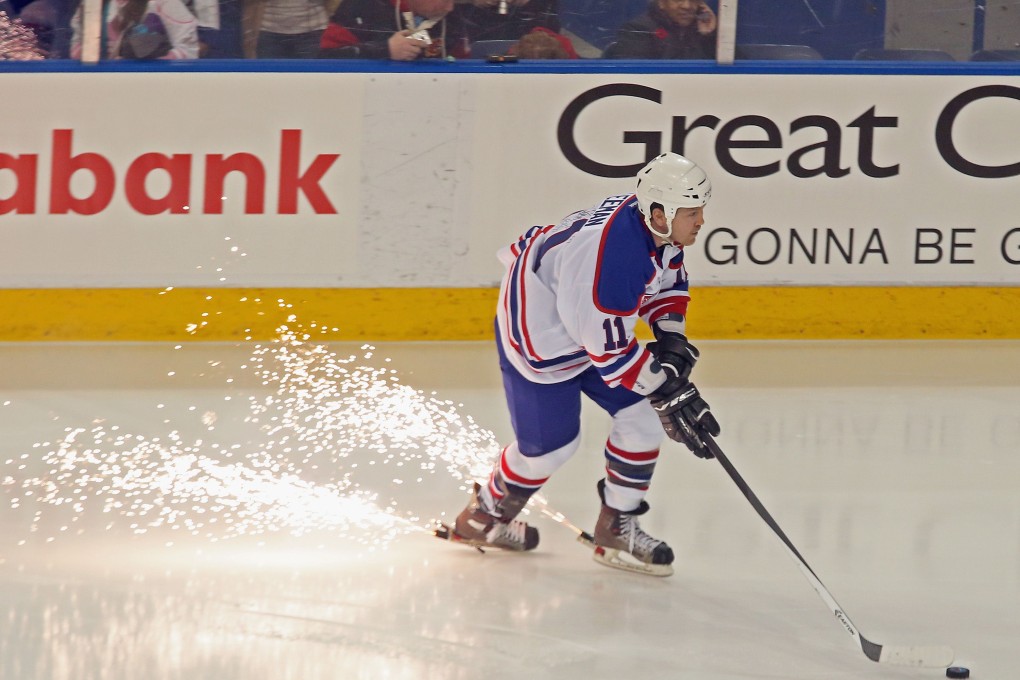 Gary Leeman, seen playing in a Hall of Fame Legends Classic game, suffered multiple concussion and sub-concussive impacts during his career. Photo: AFP