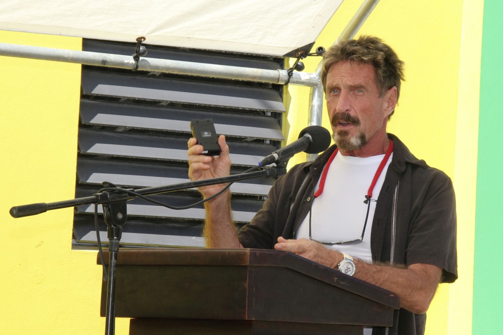 John McAfee, pictured in 2012 at the San Pedro Police Station in Ambergris Caye, Belize, has been hit with a stalking complaint. Photo: AP