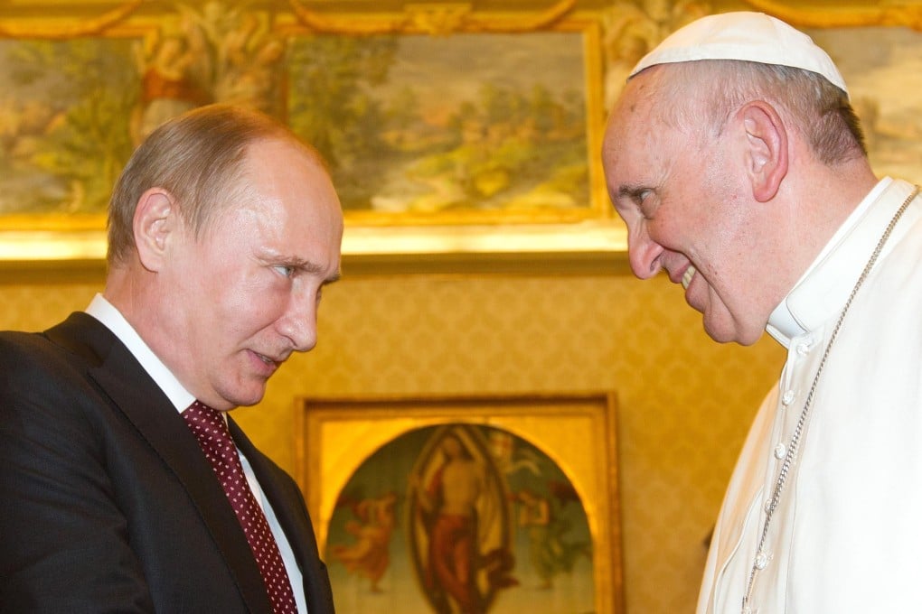 Russian President Vladimir Putin during a private audience with Pope Francis. Photo: AFP