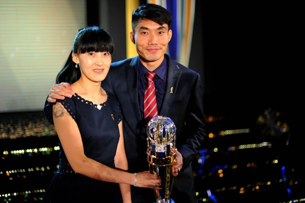 AFC Player of the Year Zheng Zhi with his wife at the AFC awards ceremony in  Kuala Lumpur. Photo: AFP