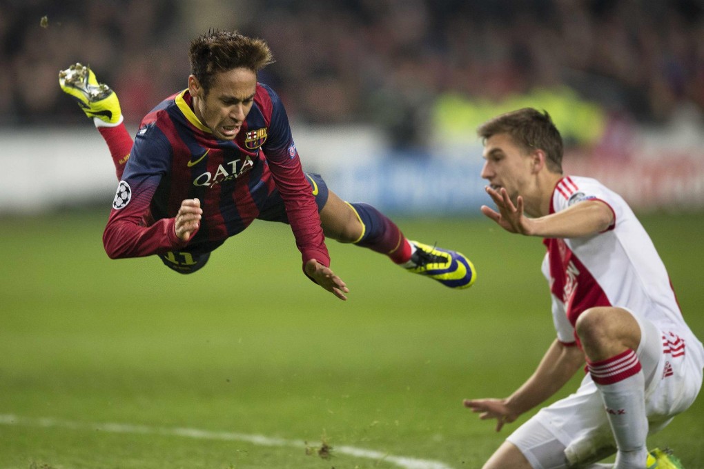 Ajax's Joel Veltman fouls Neymar for a penalty. Photo: EPA