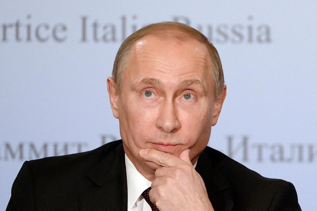 Russia's President Putin at a press conference in Italy on Tuesday. Photo: EPA