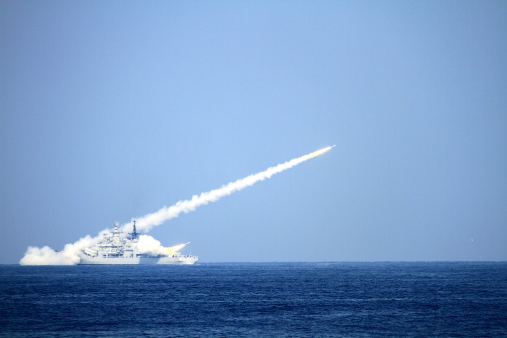 The Chinese guided missile destroyer No. 139 of the PLA Navy's North Sea Fleet fires a missile during a naval drill in the Yellow Sea on Oct. 17, 2013. Photo: Xinhua