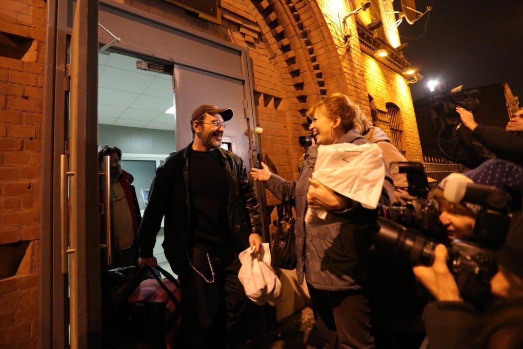 Greenpeace activists leaving detention centre. Photo: EPA