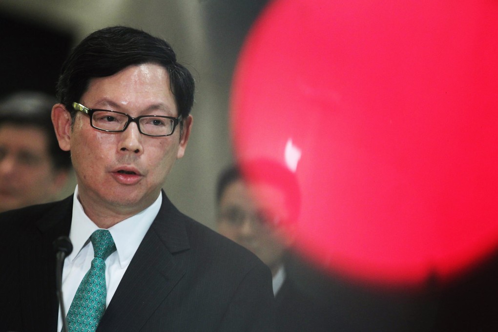 HKMA chief Norman Chan says the US ending its quantitative easing programme will have a negative effect on Hong Kong. Photo: K.Y. Cheng