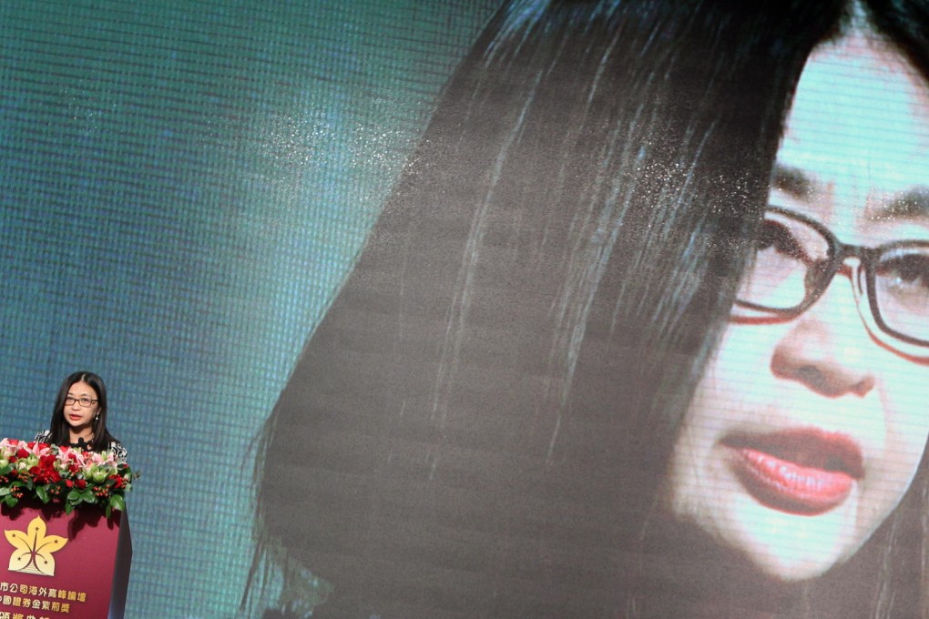 Julia Leung speaks about her resignation during a speech at a mainland finance forum in Wan Chai yesterday. Photo: Felix Wong