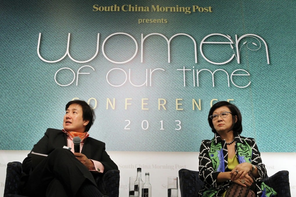 Angelina Kwan (left) and Judy Tsui discuss how companies can increase female participation in top management and their boards at a conference yesterday. Photo: Edward Wong