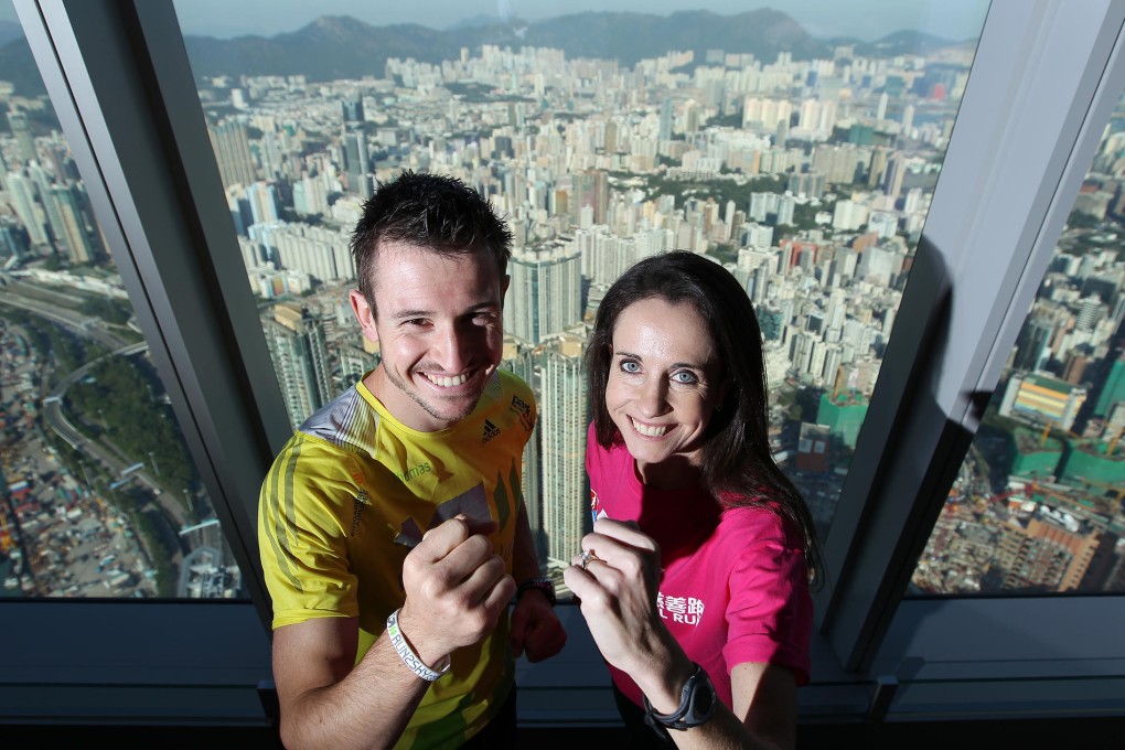 Reigning champions Thomas Dold and Suzanne Walsham get an early glimpse of the view from the top of the ICC. Photo: Nora Tam
