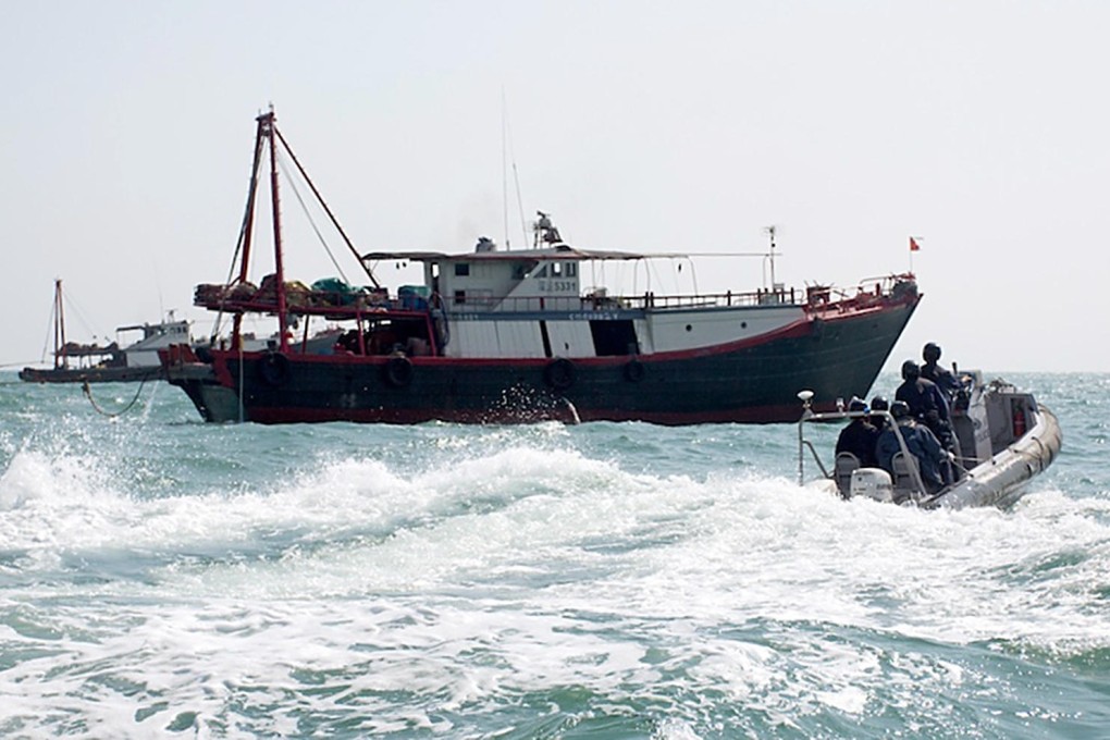 A Marine Police crew intercept a trawler that has been operating illegally in waters just east of the Soko Islands. Photo: Sea Shepherd