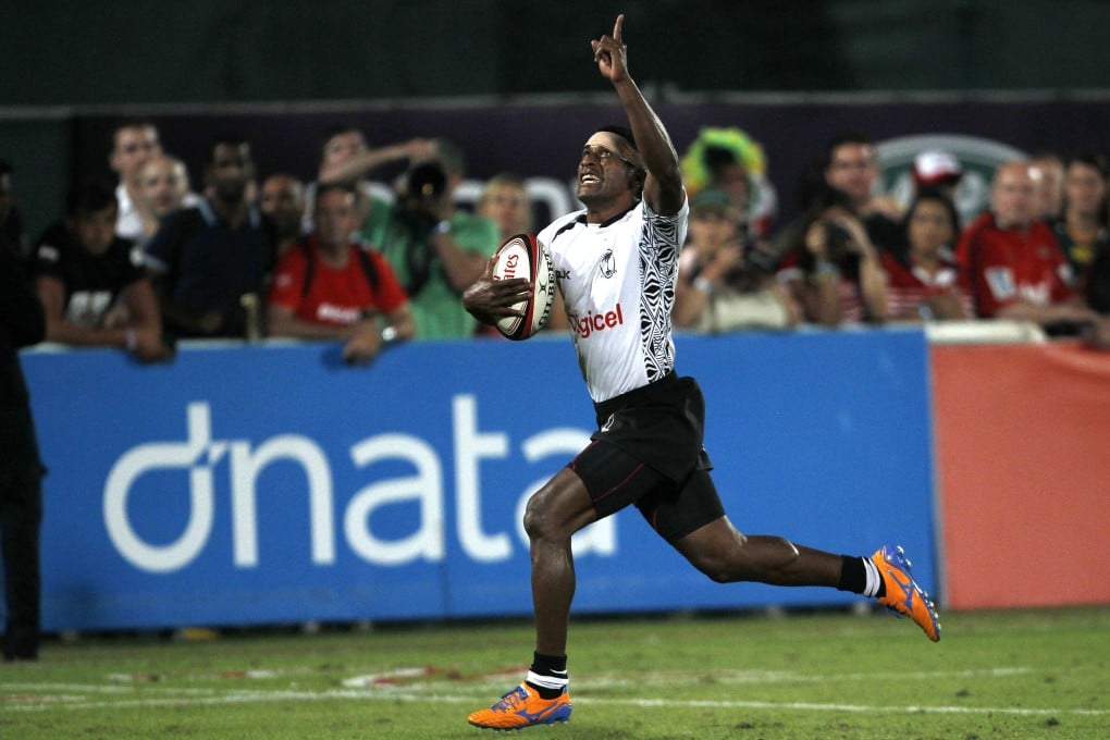 Fiji's Emosi Mulevoro heads for the try line in the matchup against South Africa in the final of the Dubai Sevens. Photo: Reuters