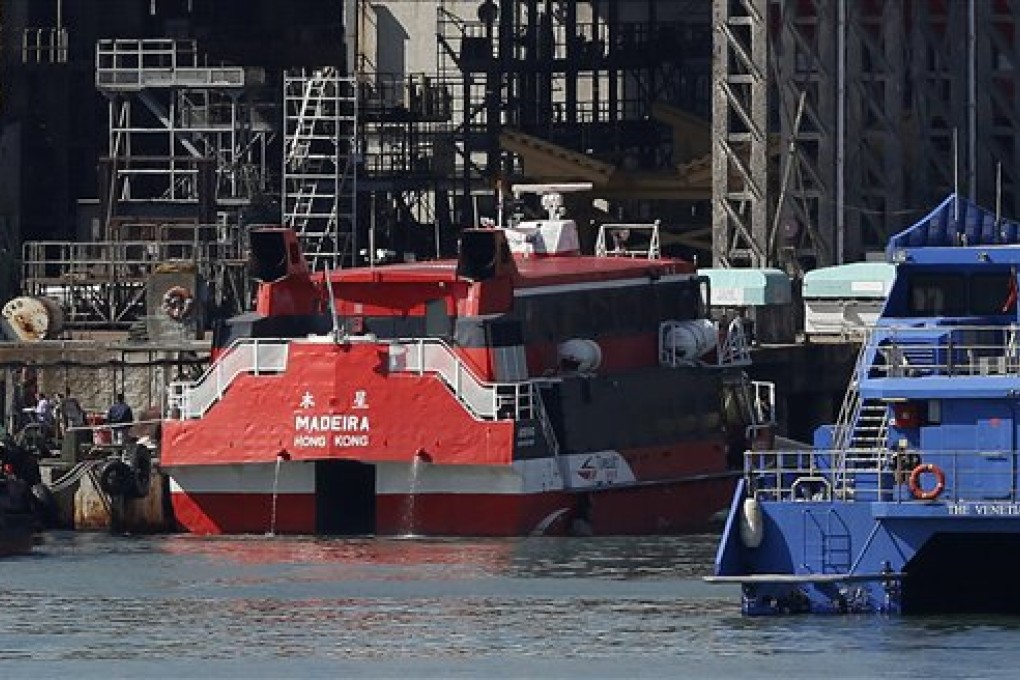 A high-speed ferry, Madeira, is docked at a shipyard after hitting an unidentified object in Hong Kong Friday, Nov. 29, 2013. The hydrofoil heading from Hong Kong to Macau struck the object off an outlying island in the predawn Friday, leaving dozens of passengers injured, authorities and the ferry company said. (AP Photo/Kin Cheung)