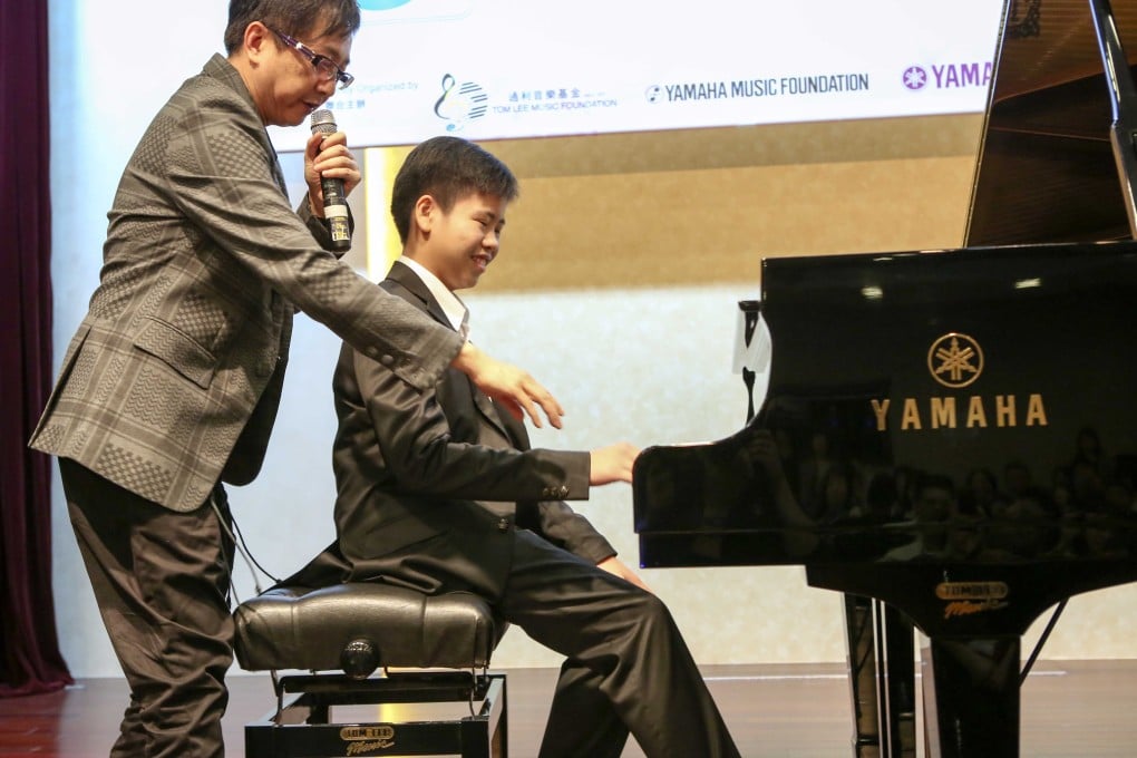 Singer-songwriter Antony Lun Wing-leung with budding composer Anson Wong Ying-Shun. Photo: SCMP