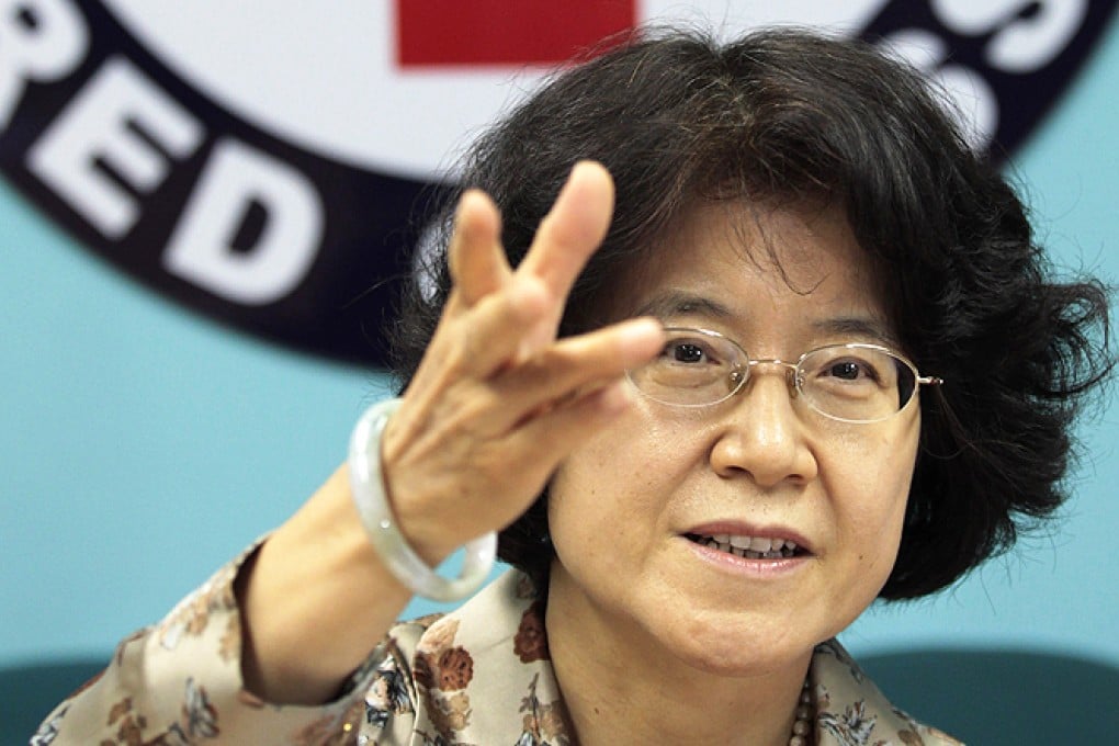 Chinese Ambassador Ma Keqing gestures as she answers questions from reporters at Philippine Red Cross headquarters in Manila, Philippines, on Monday. Photo: AP