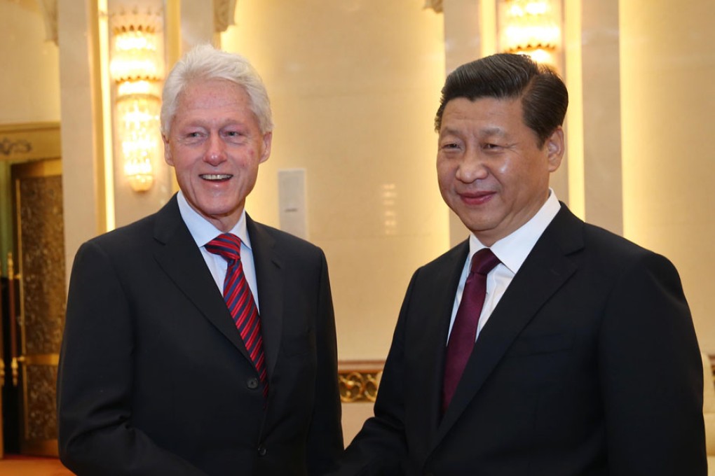 Chinese President Xi Jinping told visiting former US president Bill Clinton that the relationship between the two countries had become a "skyscraper". Photo: Xinhua