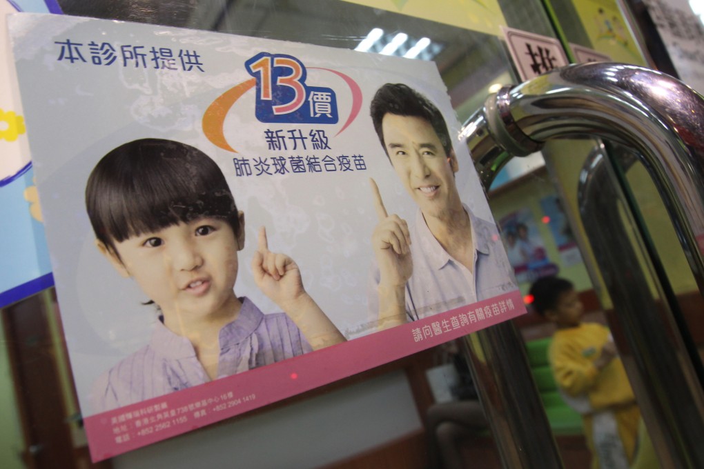 An advertisement sticker for Pneumococcal conjugate vaccine (PCV13) is seen at a clinic at Mong Kok. Photo: SCMP