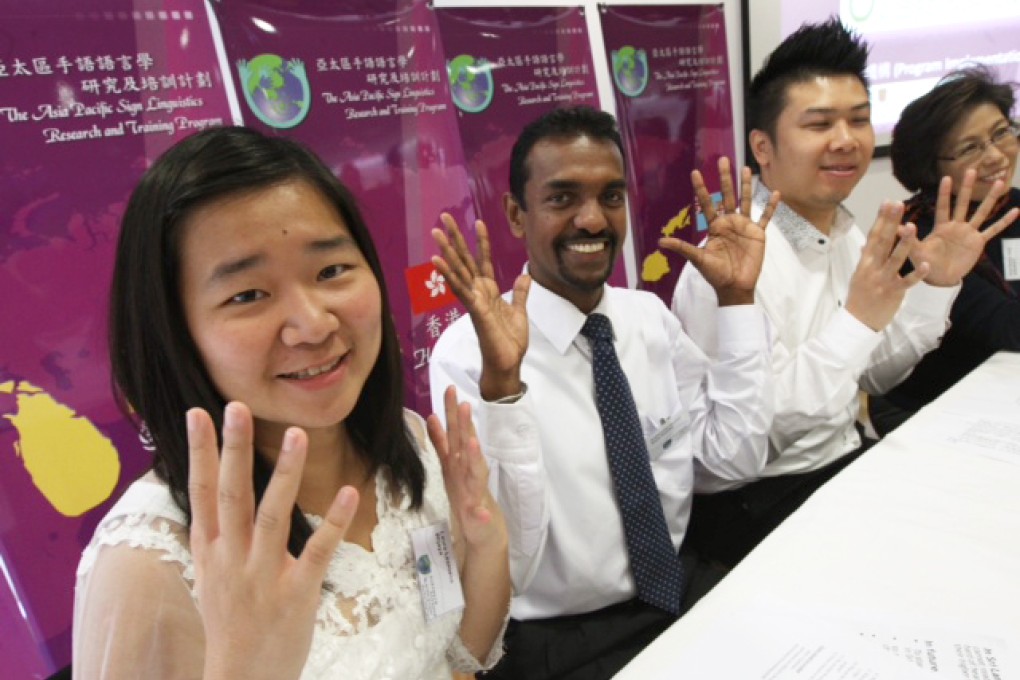 First group of deaf students complete a linguistics high diploma programme on sign language and training at CUHK.
(Left to right) Laura Lesmana Wijaya; Kodithuwakku Koralege Brayan Susantha and Kenny Chu. Photo: David Wong