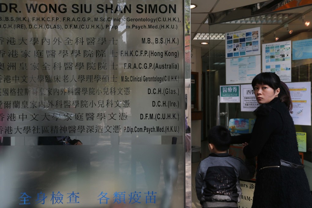 Patients visit a clinic in Tuen Mun attended by the Indonesian domestic helper now infected with H7N9. Photo: K.Y. Cheng