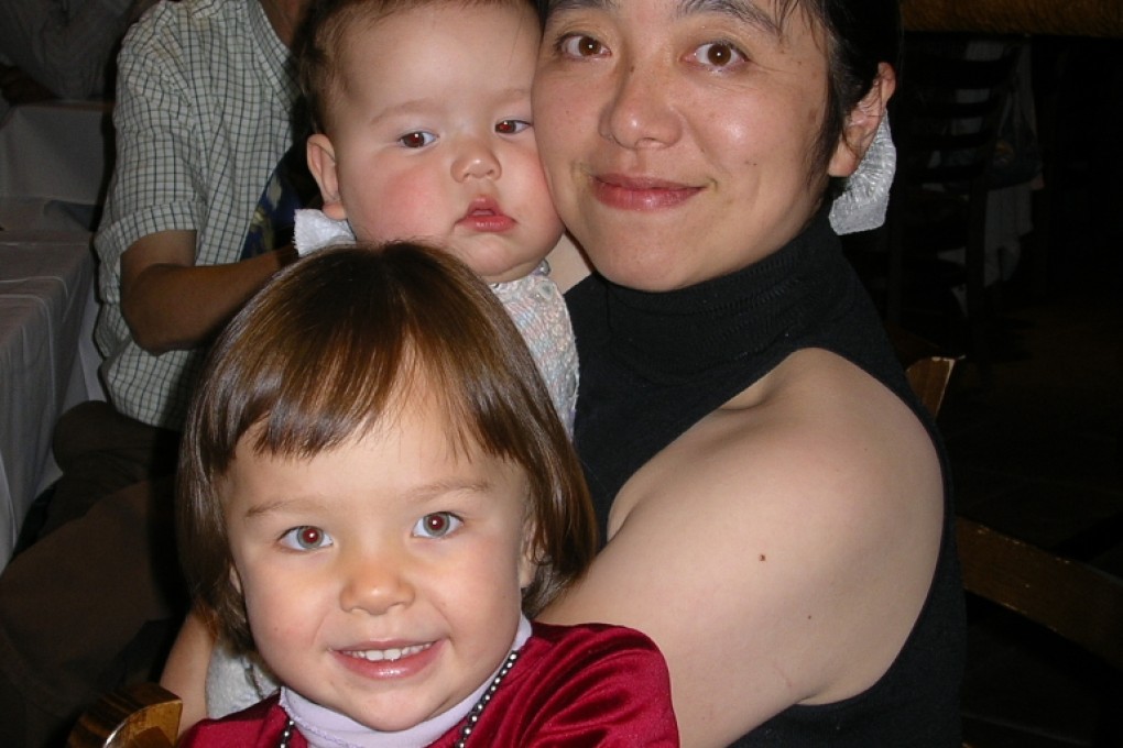 Vancouver area translator Joy Mo and her two daughters. Credit: Supplied
