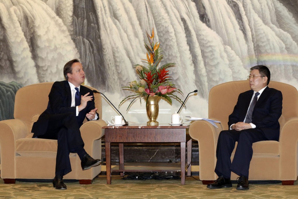 The British prime minister meets Shanghai Mayor Yang Xiong. He is leading a 100-strong business delegation. Photo: AP