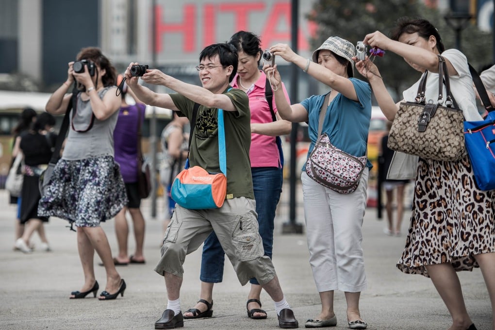Tourists from mainland China on a visit to Hong Kong. Photo: AFP