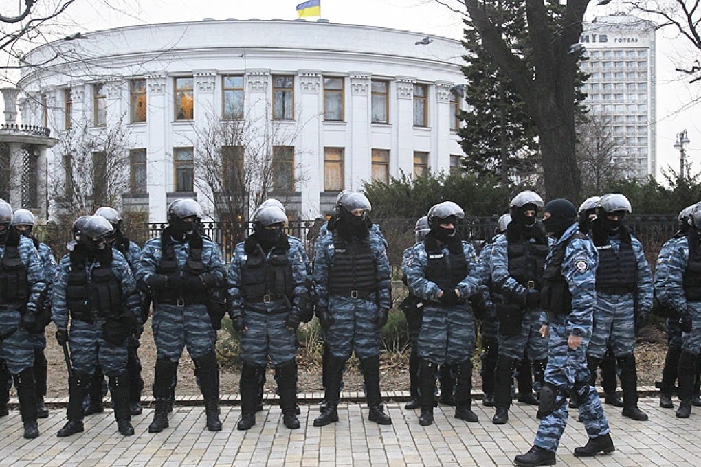 Police block the street leading to the Cabinet of Ministers in Kiev, Ukraine, Wednesday. Photo: AP