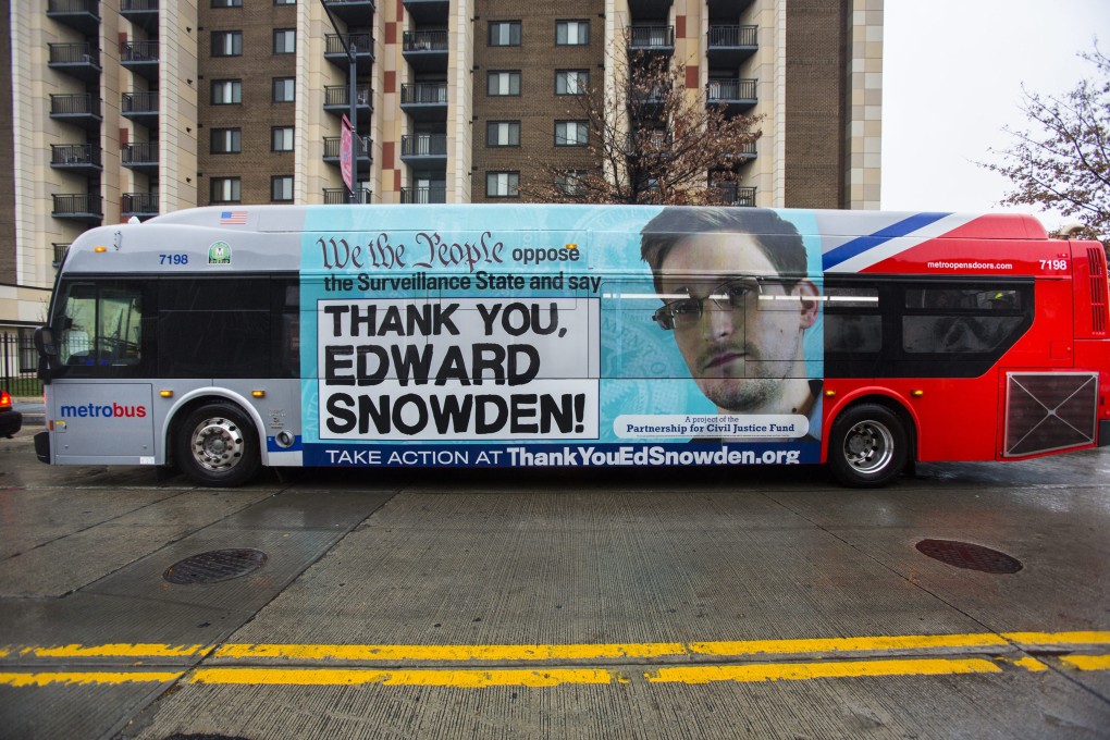 An advertisement thanking NSA leaker Edward Snowden appears on the side of a Metrobus in downtown Washington. Photo: EPA
