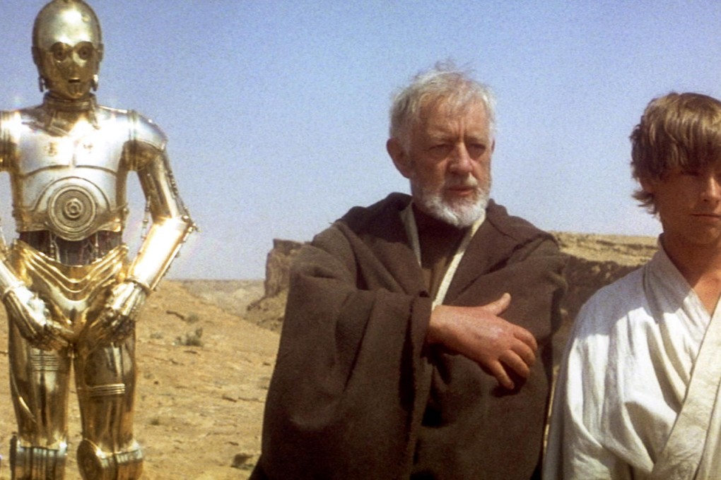Alec Guinness (centre) and Mark Hamill star in 1977's Star Wars: Episode IV - A New Hope, with Anthony Daniels as C-3PO. Photo: Corbis