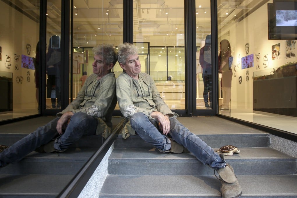 Cinematographer Christopher Doyle's art exhibition, "I Didn't Come Here And I Ain't Leaving", is at the Agnes b. Librairie Galerie. Photo: Jonathan Wong