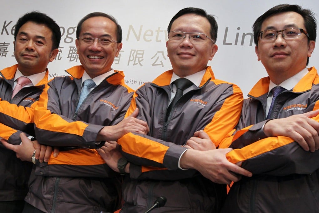 Kerry Logistics chairman George Yeo (second from left) with senior executives (from left) Edwardo Erni, William Ma and Ellis Cheng yesterday. Photo: Edward Wong