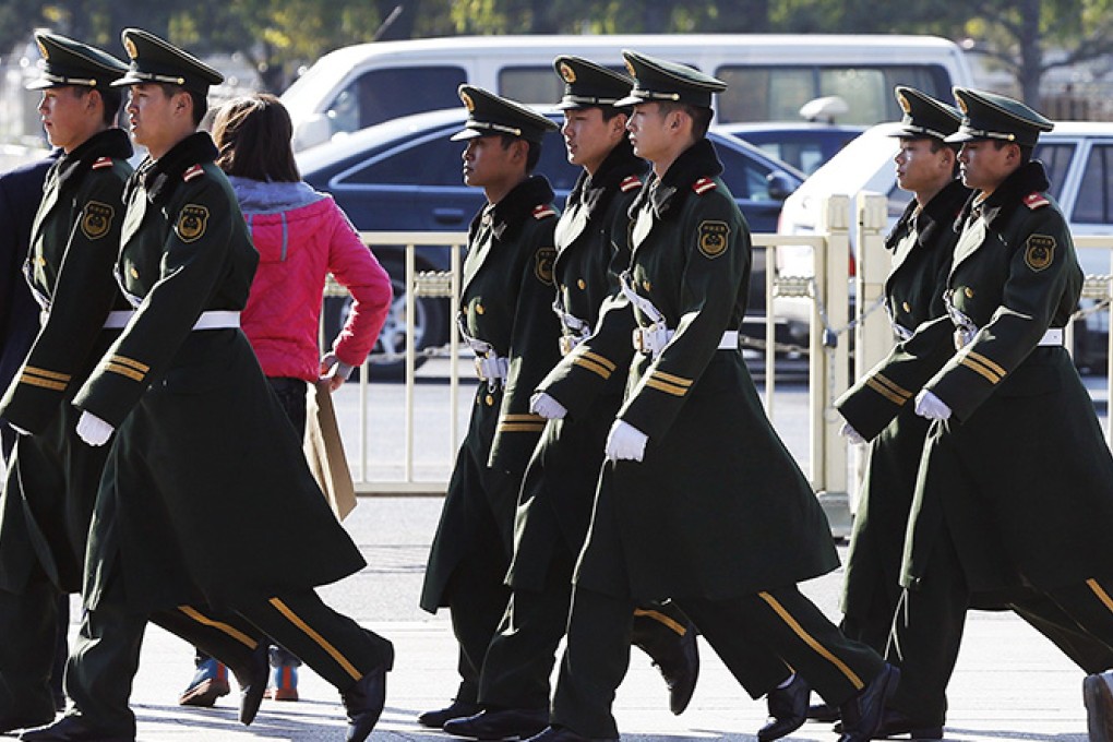 Paramilitary police in Beijing. The Communist Party may limit the use of its interrogation system. Photo: EPA