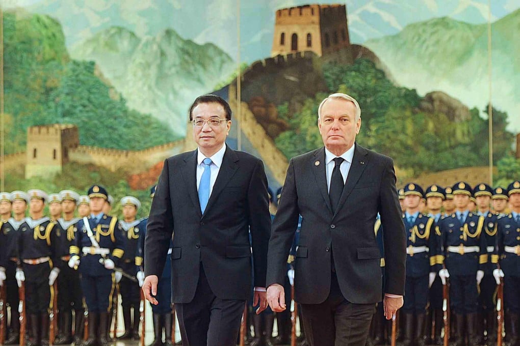 Prime Minister Li Keqiang and his French counterpart, Jean-Marc Ayrault, at the Great Hall of the People in Beijing. Photo: Xinhua