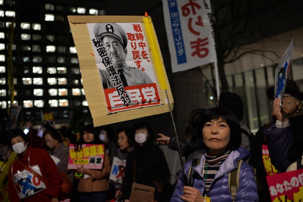 Protesters failed to block the secrets law. Photo: AFP