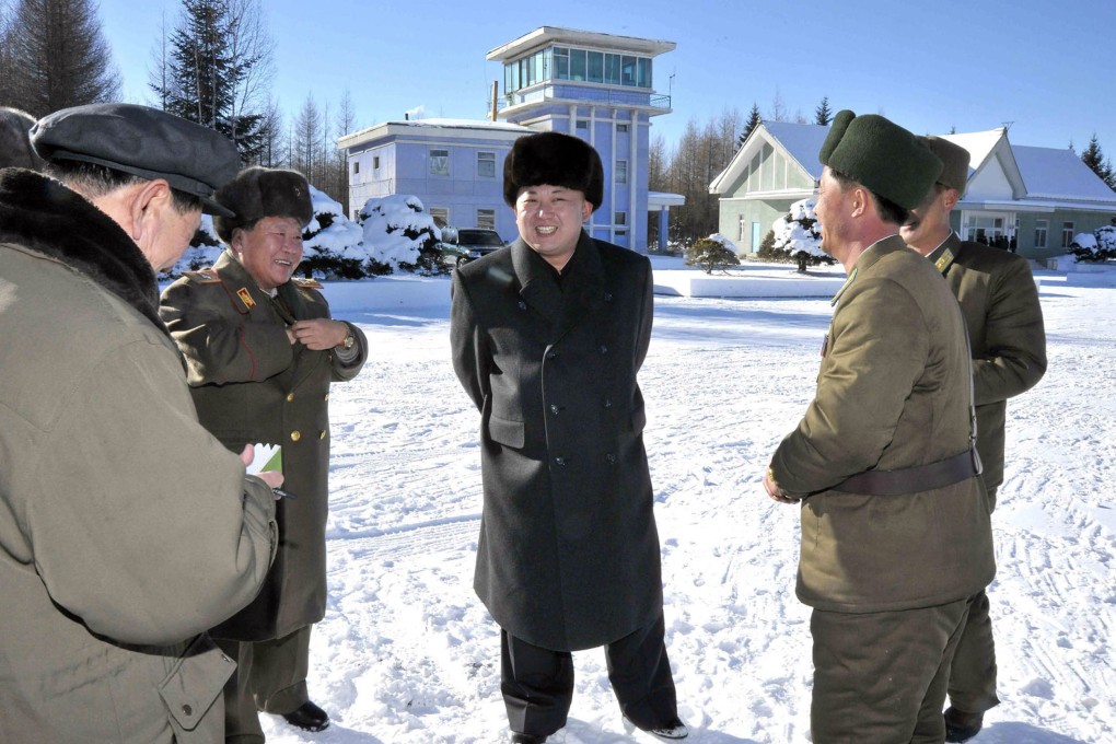 North Korean leader Kim Jong-un with military aides. Photo: AFP