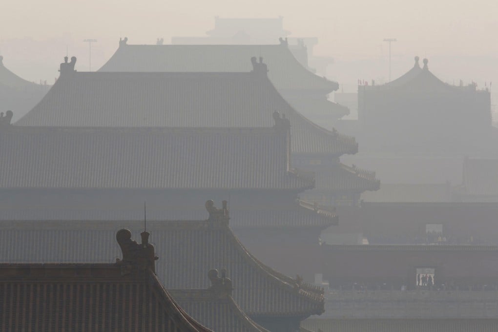 Pollution envelops the Forbidden City. Photo: AP