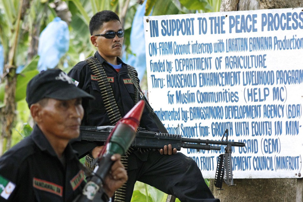 Armed Muslim guerillas of the Moro Islamic Liberation Front. Photo: AFP