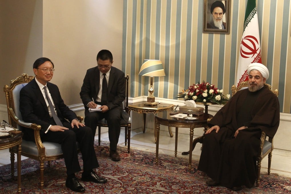 Chinese State Councilor Yang Jiechi discussed Iran's nuclear programme, Afghanistan and Syria with Iranian President Hassan Rouhani in Tehran on Sunday. Photo: Xinhua