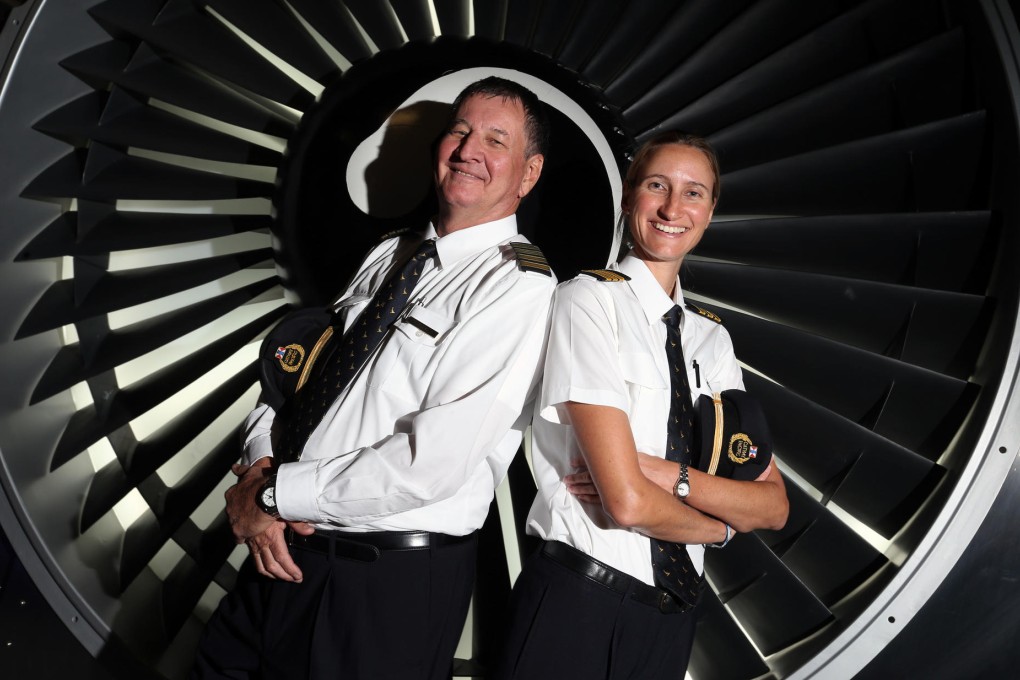 Father and daughter Stuart and Zoe Davies after co-piloting the return Cathay Pacific flight from Manila yesterday. Photo: K.Y. Cheng