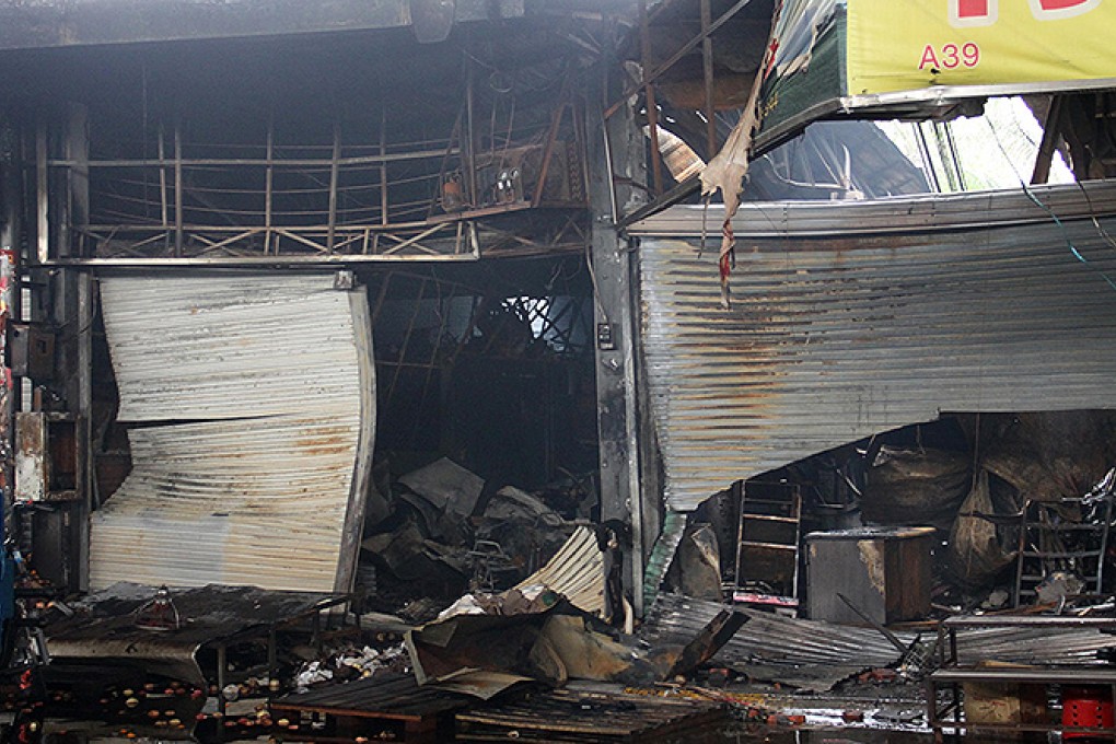 The destroyed area of the market where the deadly fire broke out early yesterday. Photo: Xinhua