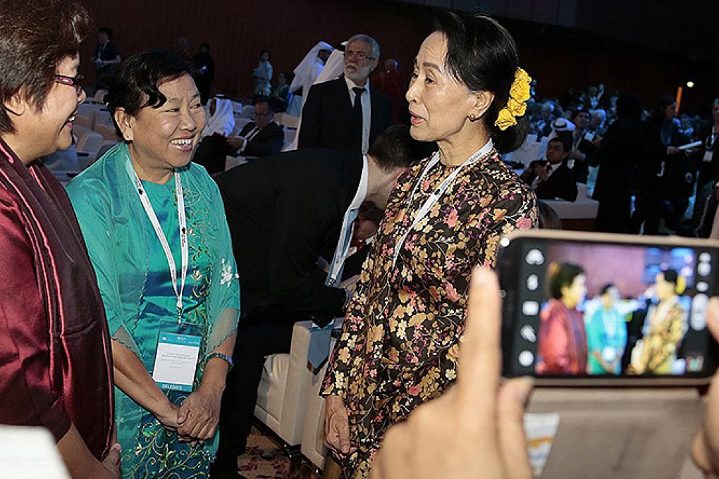 Aung San Suu Kyi. Myanmar's most famous icon may be female, but women have been invisible at the levels where decisions are made. Photo: EPA