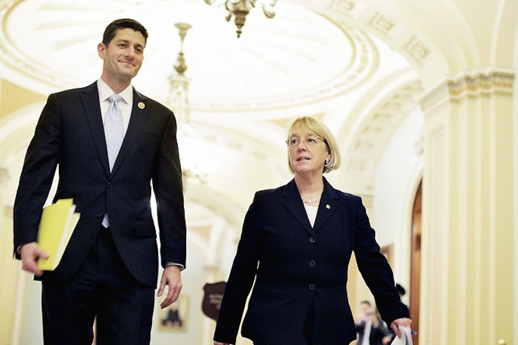 House Budget Committee Chairman Paul Ryan and Senate Budget Committee Chairman Patty Murray walk past the senate chamber on their way to a press conference to announce a bipartisan budget deal, the Bipartisan Budget Act of 2013, on Tuesday in Washington, DC. Photo: AFP