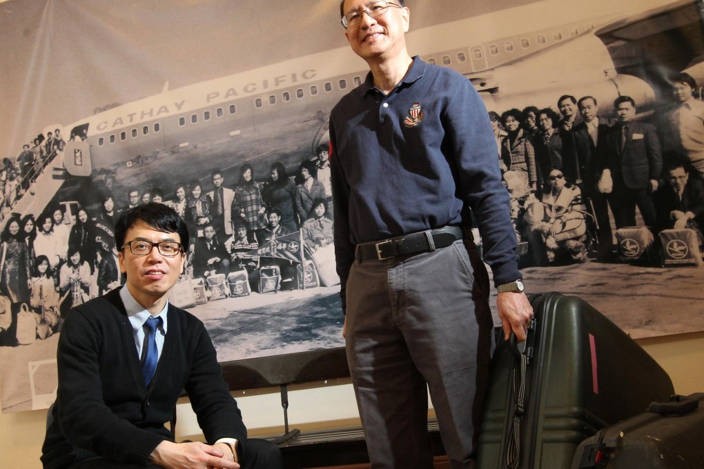 James Ng (left) and Hui Kei-chung in front of the picture, on display at an exhibition in Sai Ying Pun dedicated to Kai Tak. Photo: Felix Wong
