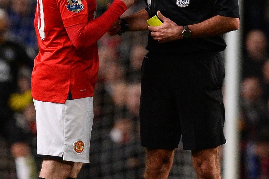 Wayne Rooney seems to get away with abusing referees. Photo: AFP