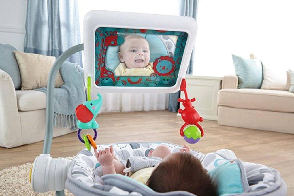 A child entertained by the iPad baby seat. Photo: SCMP