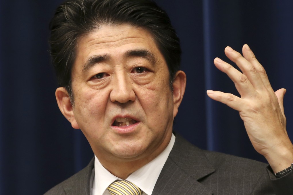 Japanese Prime Minister Shinzo Abe's government will approve rules helping air, land and sea forces working together more effectively in the face of danger. Photo: AP