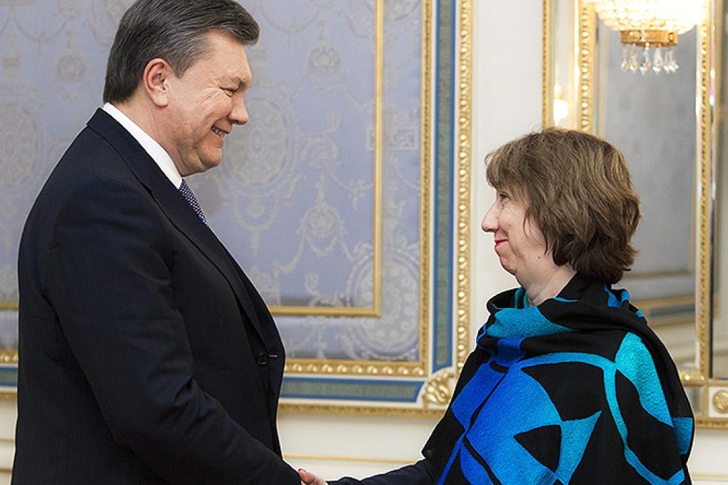 Ukraine's President Viktor Yanukovych greets EU Foreign Policy Chief Catherine Ashton prior their talks in Kiev. Photo: EPA