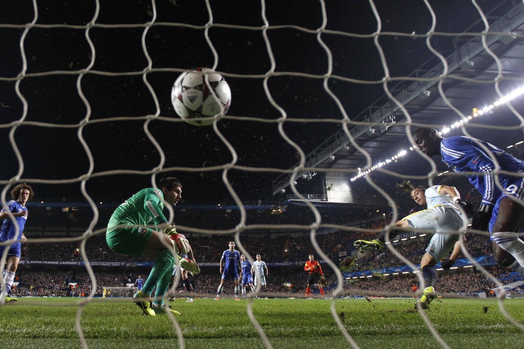 Chelsea's Demba Ba scores a goal against Steaua Bucharest in their Champions League soccer match at Stamford Bridge. Photo: Reuters