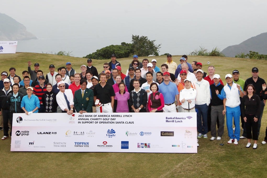 Bank of America Merrill Lynch staff, their clients, friends and family enjoy a day out at the Clearwater Bay Golf and Country Club yesterday. Photo: Jonathan Wong