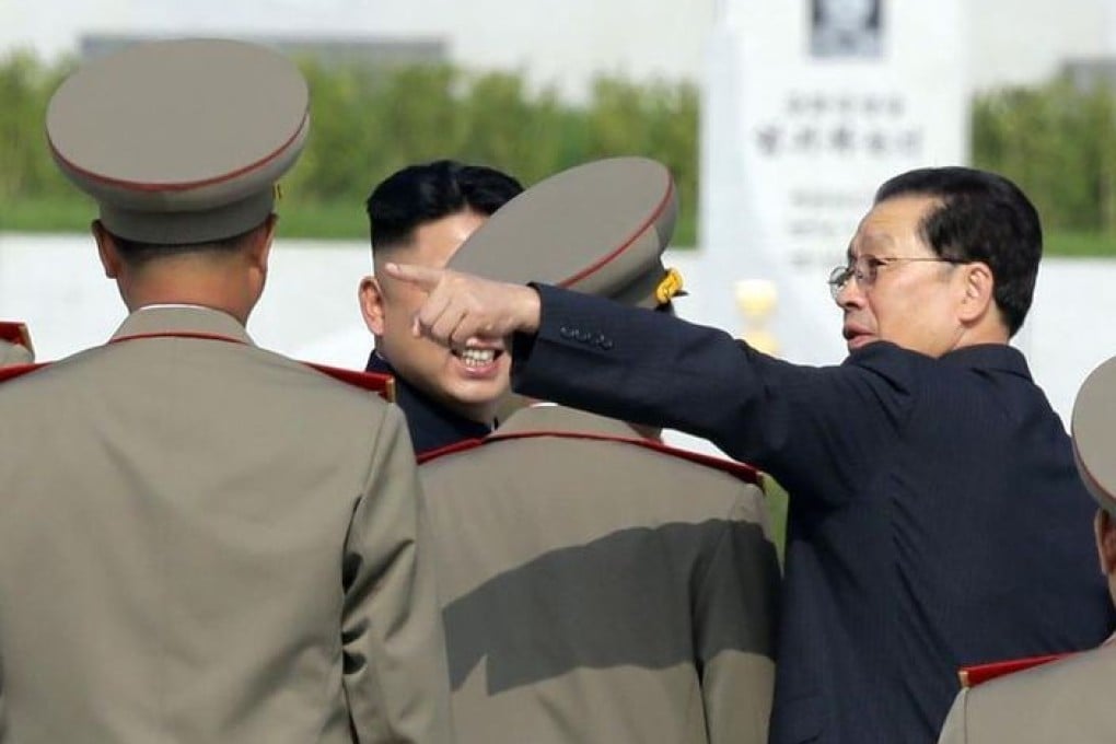 Jang Song-thaek seen with Kim Jong-un in an undated file photo.