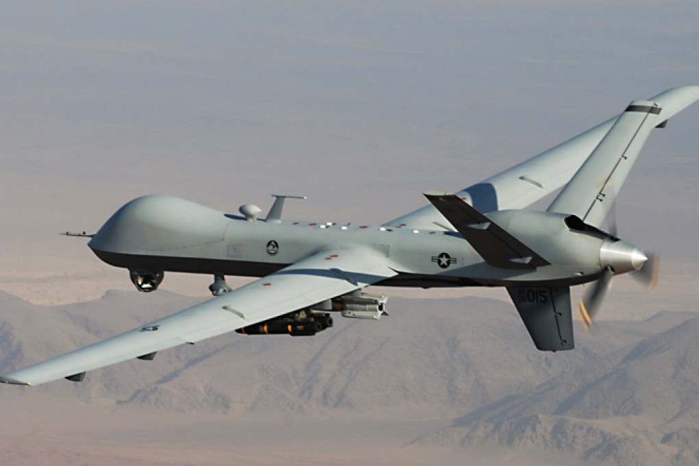 An MQ-9 Reaper, armed with laser guided bombs. Photo: AP